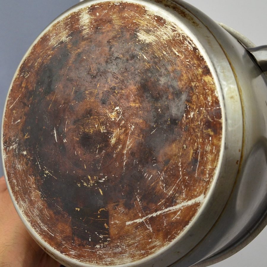 Burnt pot bottom before cleaning